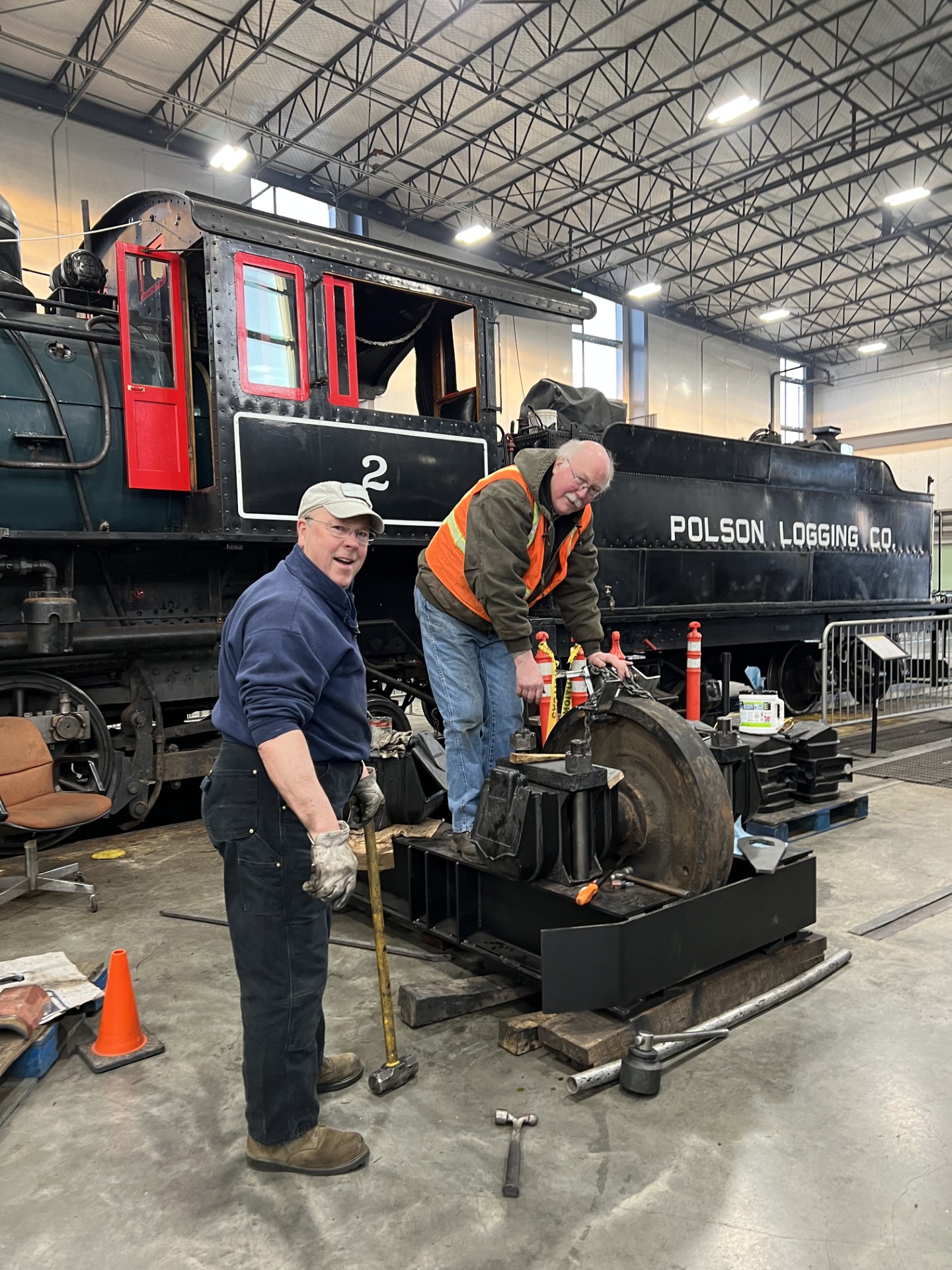 Pat Tracy of the Oregon Rail Heritage Foundation working on a locomotive